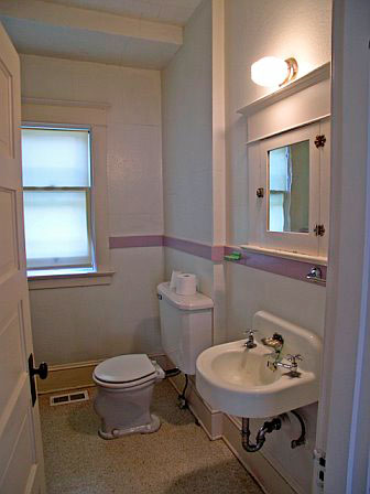 Bungalow bath with poor tub placement - before